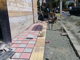 عملیات جدول گذاری و کف فرش معابر سطح شهر توسط شهرداری منطقه دو سنندج