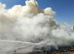 مهار شعله های آتش در انبار ضایعات کارخانه مارال صنعت
