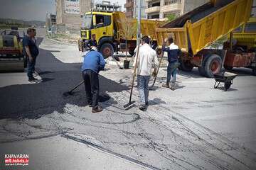 عملیات لکه‌گیری و آسفالت‌ریزی خیابان ۳۵ متری شهرک خاوران