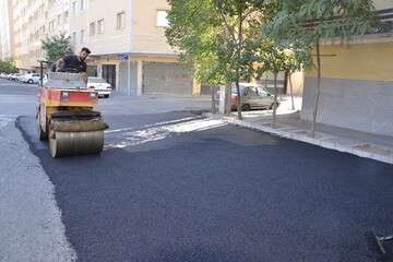 توزیع ۹۰ تن آسفالت در کوی لقمان حکیم جلالیه